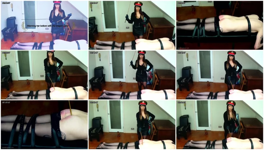 Miss-Sultrybelle-Warming-her-bottom-with-my-dragon-cane_thumb.webp