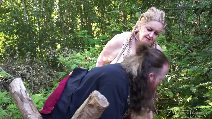 Screenshot 3 from Viking Queen Punishment – Mistress Iceni, Jamie Fenrir, spanking, belt, punishment, outdoors