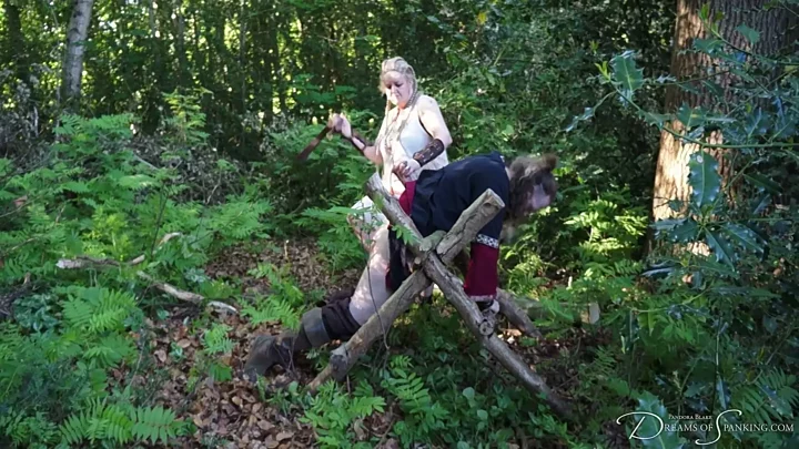 Screenshot 7 from Viking Queen Punishment – Mistress Iceni, Jamie Fenrir, spanking, belt, punishment, outdoors